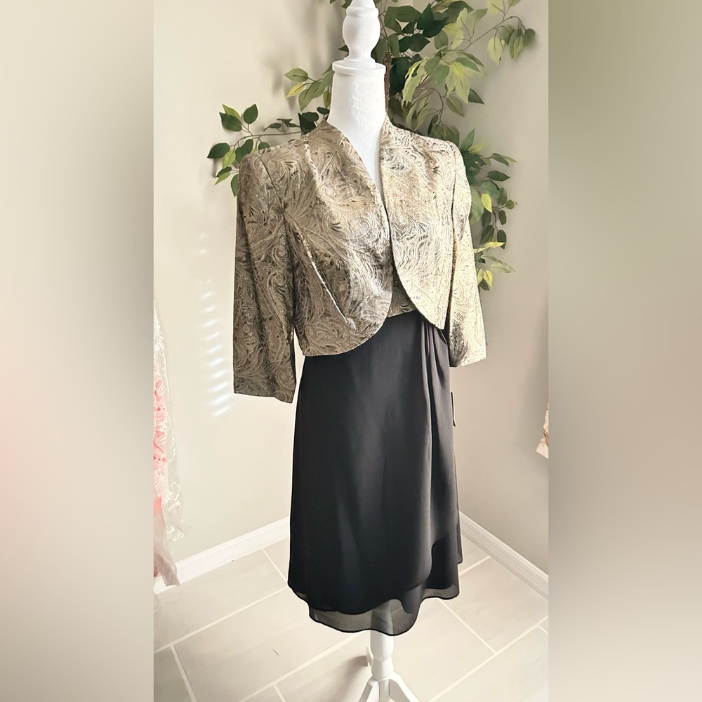 Elegant Black Skirt with Gold Patterned Jacket